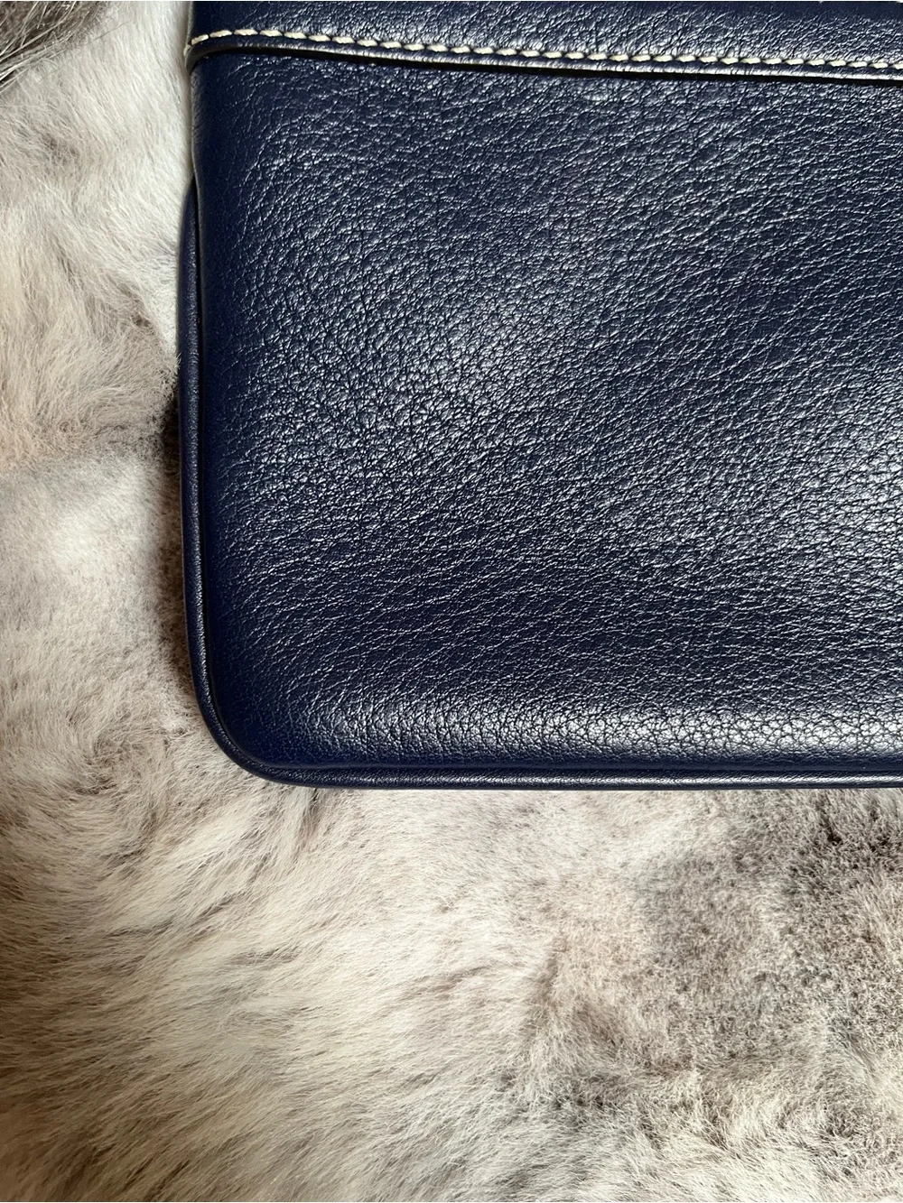 Dooney & Bourke Navy Pebbled Leather Wristlet with Fur Pom